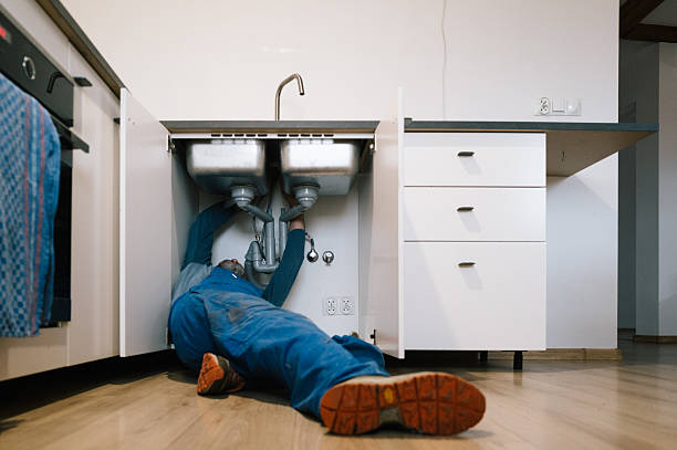 Professional Emergency Plumber technician working in Wilson, PA